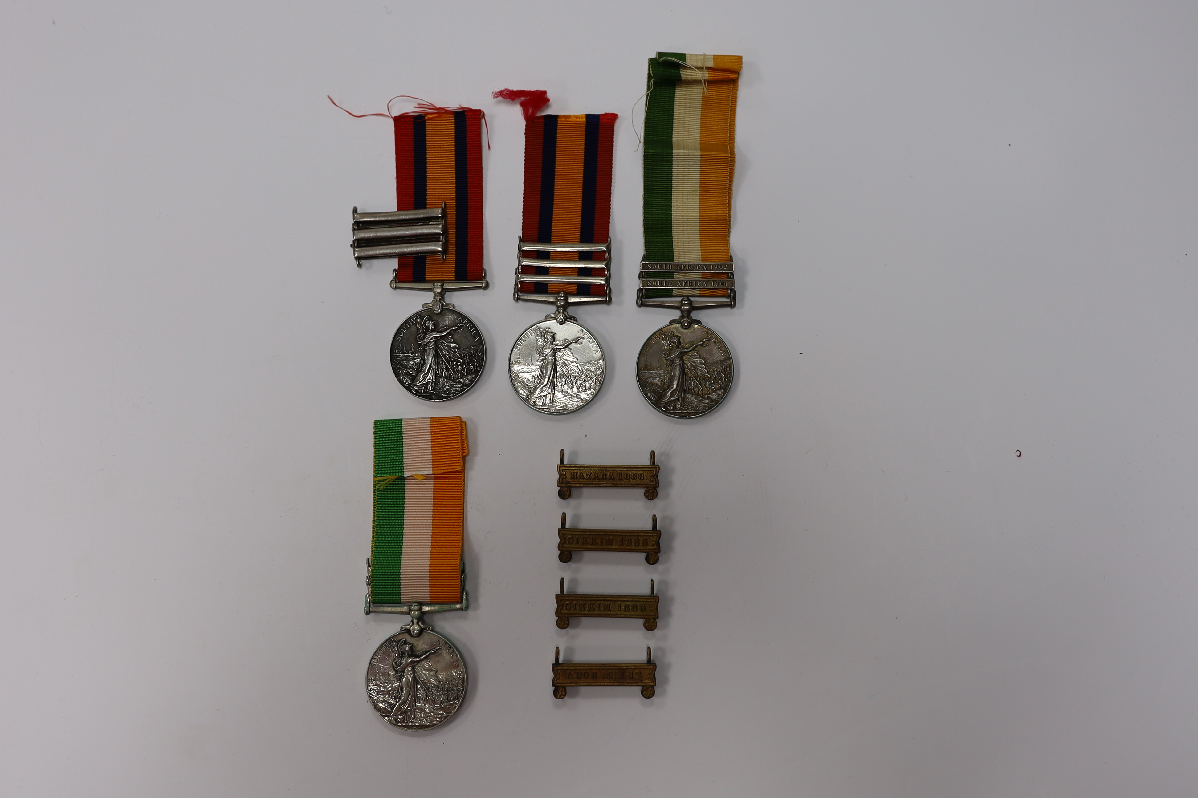 Assorted medals; two replica British North Borneo medals; Balaklava medallion; bronze GV medal; German China Campaign medal; bronze NRA medallion, unnamed